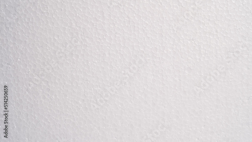 White foam sheet top view. Small and large clear foam beads, polystyrene sheet surface in closeup, close-up seamless background