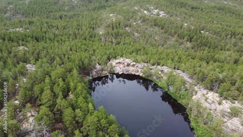 Lake Shaitankol meaning Devil's Lake Karkaraly. Drone view photo