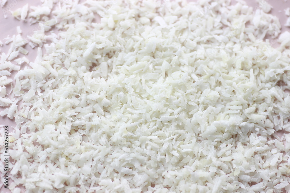 Coconut flakes close up macro background Coconut flakes close up macro background