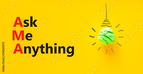 AMA ask me anything symbol. Concept words AMA ask me anything on yellow paper on a beautiful yellow background. Green light bulb icon. Business and AMA ask me anything concept. Copy space. photo