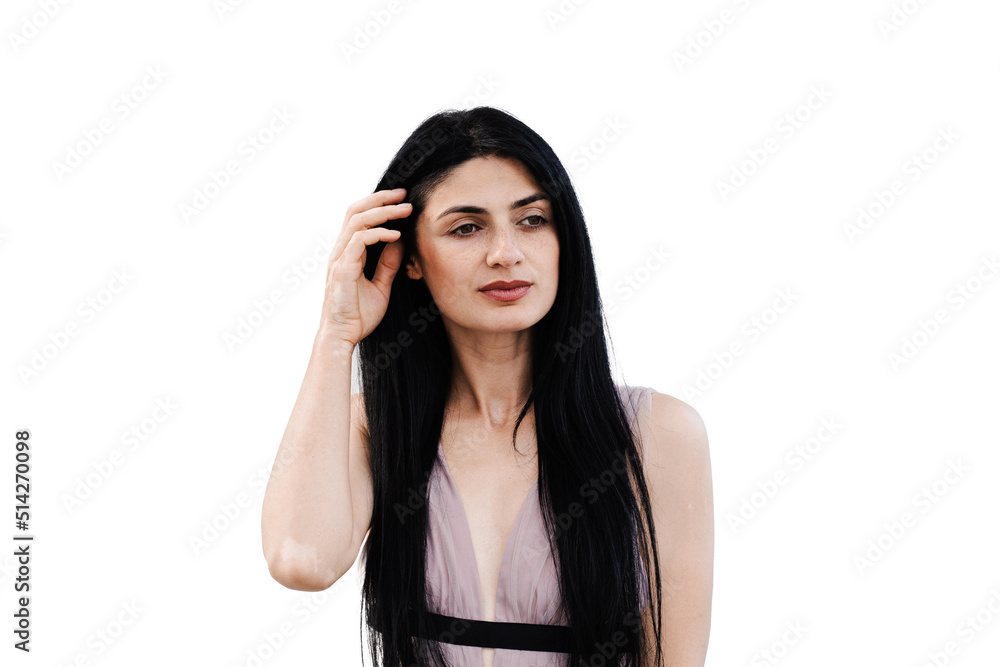 Tender Georgian woman in fashion dress posing on white background. Attractive girl is posing in studio. Tender Georgian woman in fashion dress posing on white background. Attractive girl is posing in studio.