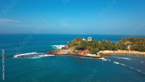 Beach coastline in Unawatuna, Sri Lanka. Popular destination for tourists visiting Sri Lanka. Situated close to Galle and Mirissa