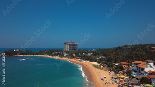 Beach coastline in Unawatuna, Sri Lanka. Popular destination for tourists visiting Sri Lanka. Situated close to Galle and Mirissa