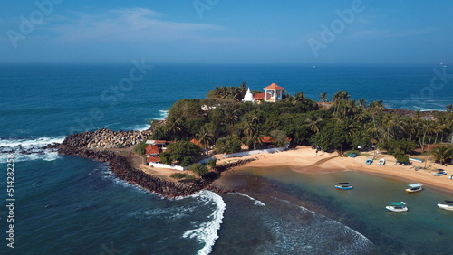 Beach coastline in Unawatuna, Sri Lanka. Popular destination for tourists visiting Sri Lanka. Situated close to Galle and Mirissa