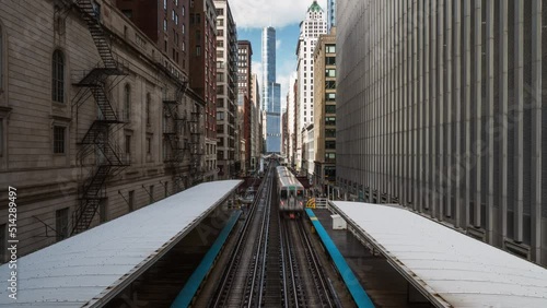 Time-lapse of trains traffic transportation at Adams/Wabash Chicago loop railway station in downtown Chicago Illinois, United States. USA urban public transport, or American people city life concept photo