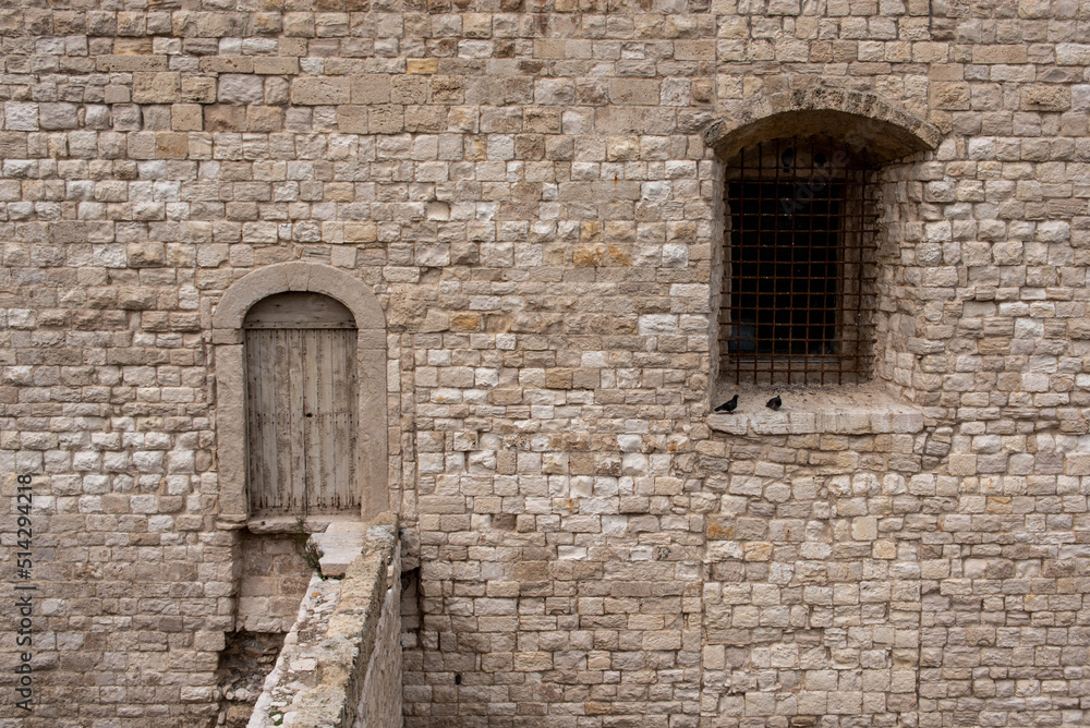 Door and window at the castle of Trani, Italy Door and window at the castle of Trani, Italy