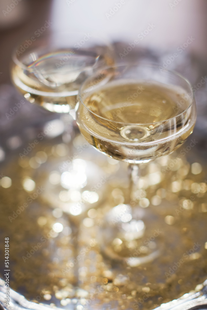 Glass of champagne with golden stars Glass of champagne with golden stars
