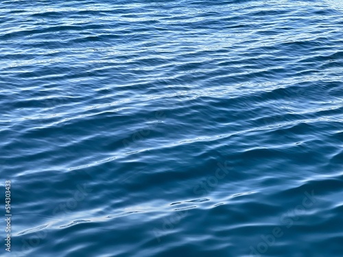 Blue sea water ripples background.