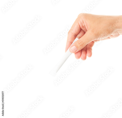 The right hand holds the stick pack. The image is isolated on a white background. Can be used to present your product.