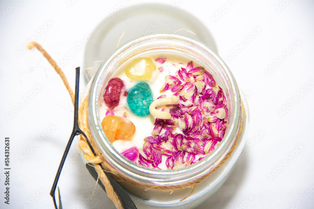 scented candles in glass jar with decorative elements scented candles in glass jar with decorative elements