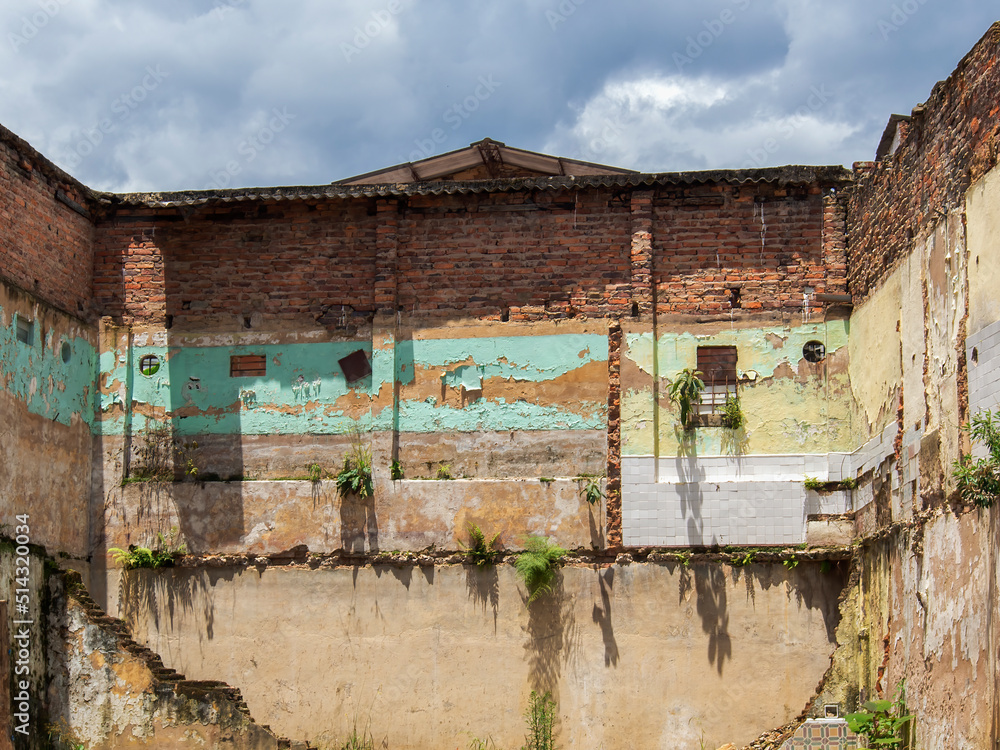 View of the remain brick walls and stairs of a demolished house in the town of Moniquira, in central Colombia.
