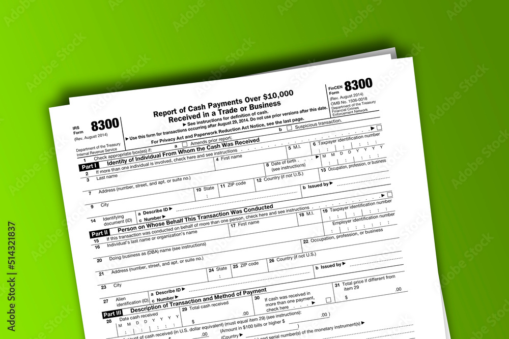Form 8300 documentation published IRS USA 08.29.2014. American tax document on colored Form 8300 documentation published IRS USA 08.29.2014. American tax document on colored