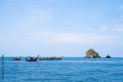 longtail boats over Jabang dive site at Koh Lipe Thailand
