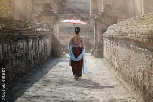 Photography Beautiful Thai girl in Thai costume,Asian woman wearing traditional Thai culture at Tempple Ayutthaya, Thailand