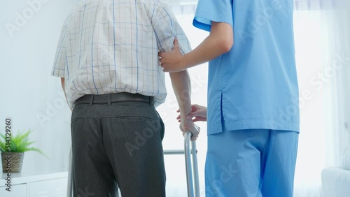 Asian senior elderly man patient doing physical therapy with caregiver