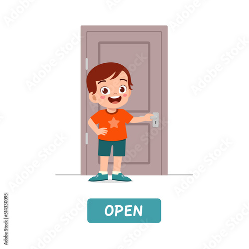 little kid standing and holding door knob