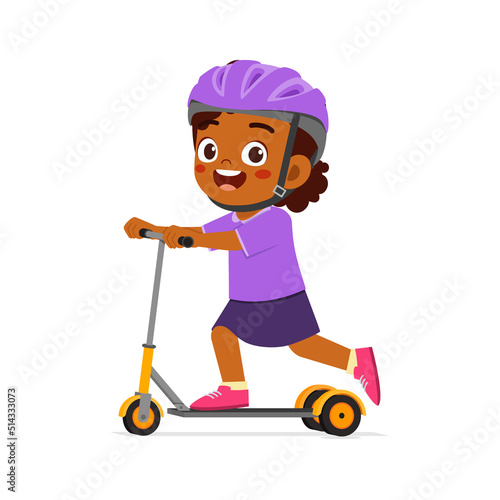 little kid ride scooter and wear helmet