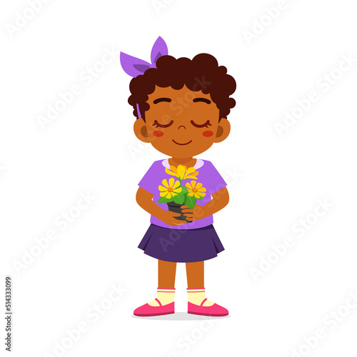 little kid holding flower with good smell