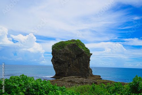 Chuanfan Rock,  a large piece of coral rock that broke off the mainland. Taiwan's southernmost point and one of the peninsula's most notable landmarks. Pingtung County, Taiwan. photo