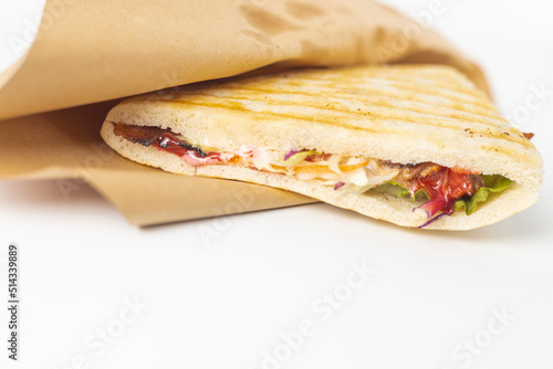 Delicious ham sandwich on white background. healthy ham and cheese with mayonnaise sandwich. Triangle sandwich with ham and cream cheese. Image about fast food.