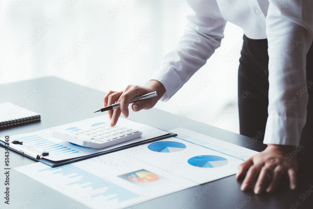 Data Analysis for Business and Finance Concept. Businessman Accounting Calculating Cost Economic Financial data. Data Analysis for Business and Finance Concept. Businessman Accounting Calculating Cost Economic Financial data.