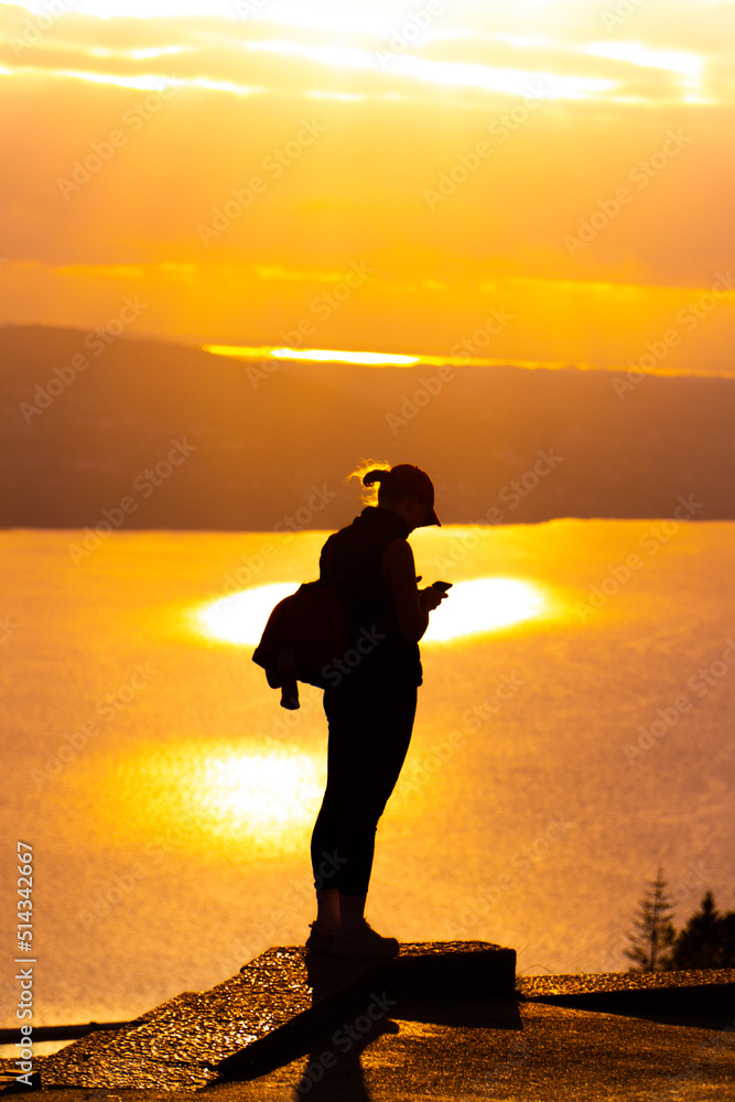 silhouette of a person at the sunset