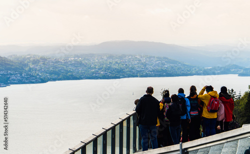 people on a mountain seeing the landscape