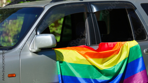 Rainbow flag on car. LGBT concept.