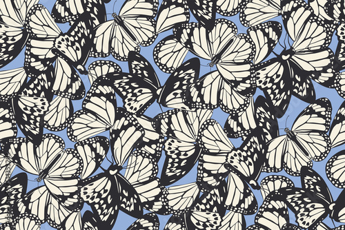 Nature inspired seamless pattern. Abstract fashion print with butterflies for fabric, wallpaper, package, gift paper. Vector animalistic background
