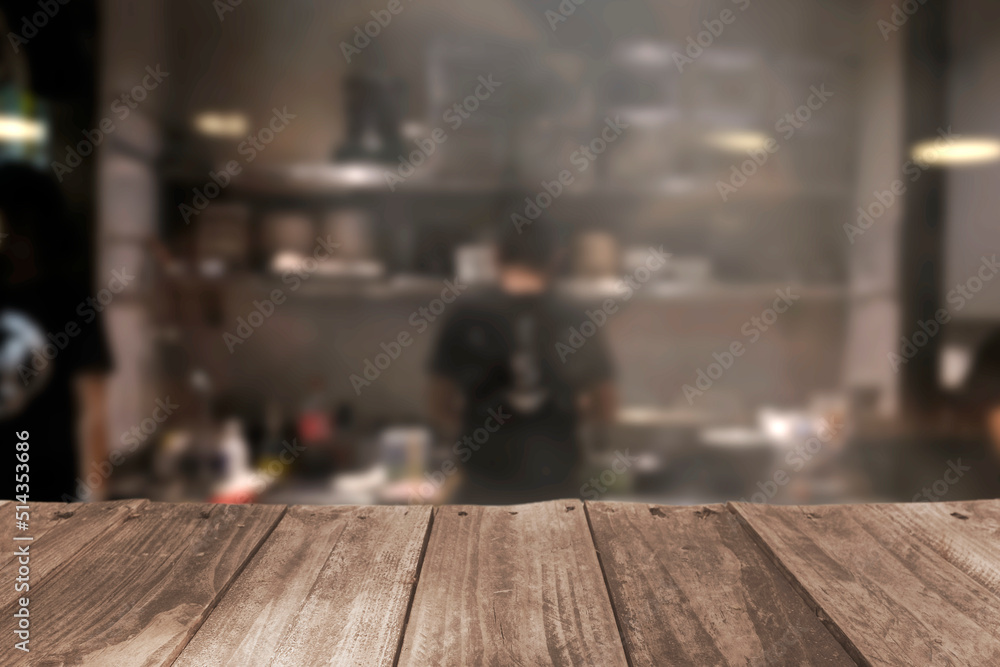 Wood top table blur kitchen in restaurant background .For montage product display or design key visual layout.