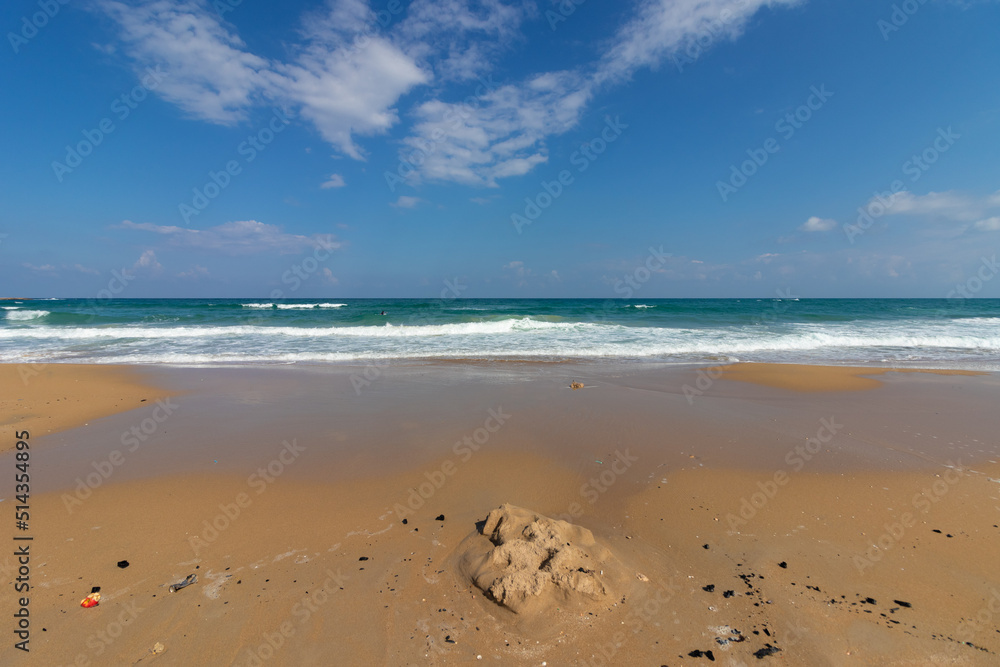 The beach at Atlit in Israel - the Mediterranean, sand and waves The beach at Atlit in Israel - the Mediterranean, sand and waves