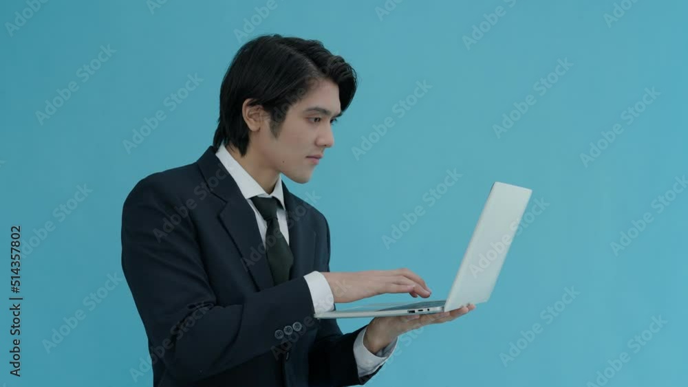 Business man checking the name list pass contact government on the Internet. Men are very crazy when they find the award. Men use the Internet on their computers reducing time to find information...