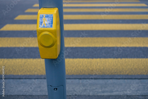 pedestrian button or traffic light button at intersection or crosswalk in Zurich, Switzerland