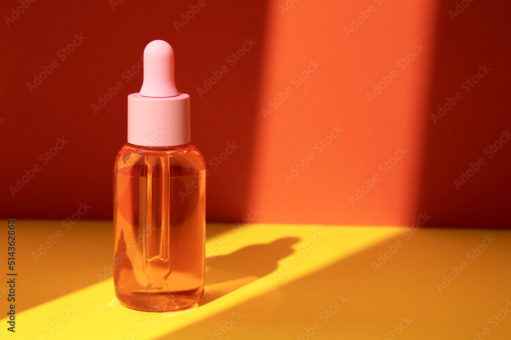 Hyaluronic acid oil, serum with collagen and peptides skin care product. Nature cosmetic in glass bottle and shadow. Hyaluronic acid oil, serum with collagen and peptides skin care product. Nature cosmetic in glass bottle and shadow.