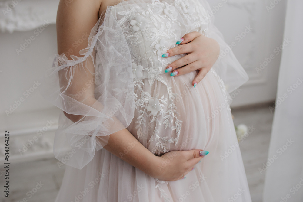 Background with a pregnant woman in stylish clothes