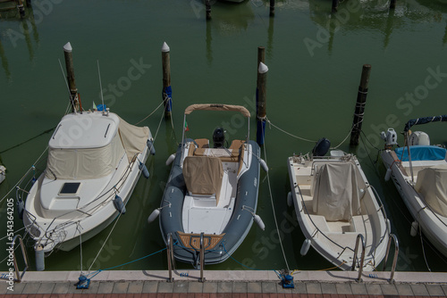 Cattolica Italy 2022: Small boats docked in the port in Roman Emilia © pierluigipalazzi