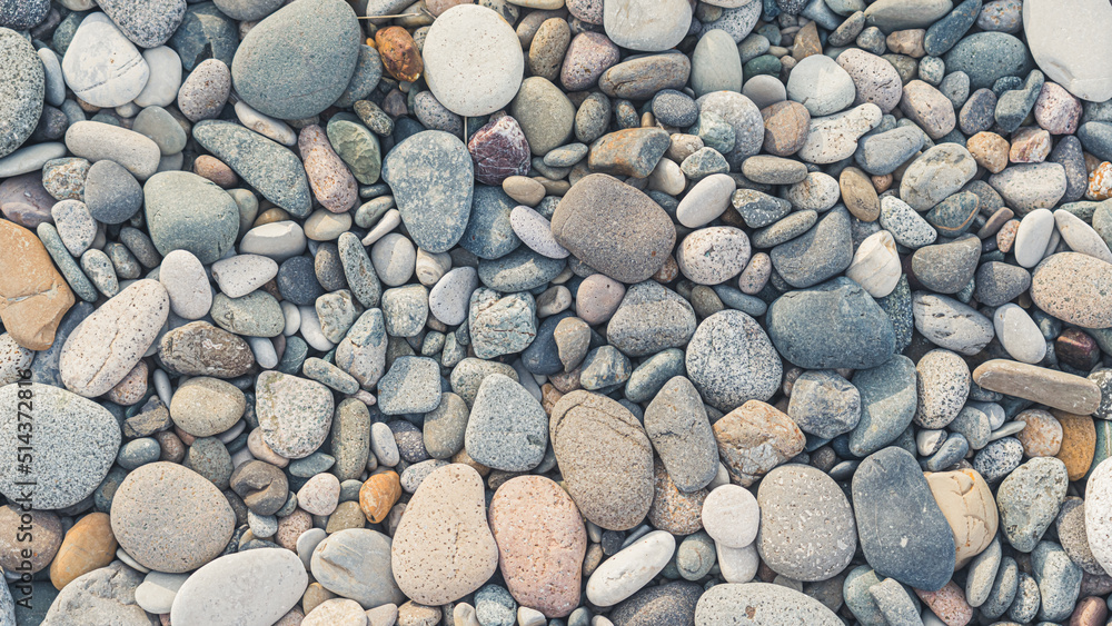 Shingle beach. Soft-colored dry pebbles and stones. Wallpaper idea. High quality photo Shingle beach. Soft-colored dry pebbles and stones. Wallpaper idea. High quality photo