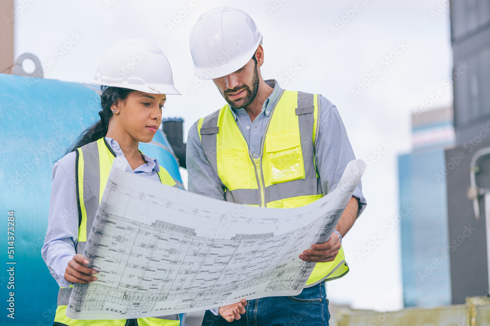 Technician working and inspecting the pipeline in factory Technician working and inspecting the pipeline in factory