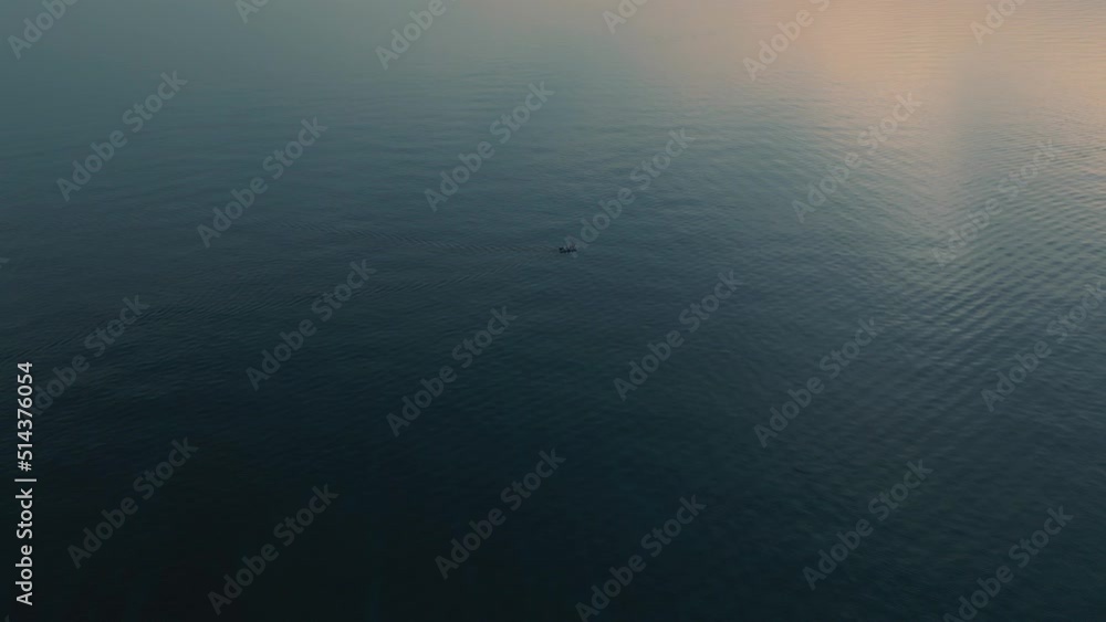 Sailing boat in Istria. Ship with a sail in the clear blue and calm mediterranean seaside water at a scenic beach coast bay in Croatia. Aerial drone air flight at tourist holiday destination in nature Sailing boat in Istria. Ship with a sail in the clear blue and calm mediterranean seaside water at a scenic beach coast bay in Croatia. Aerial drone air flight at tourist holiday destination in nature