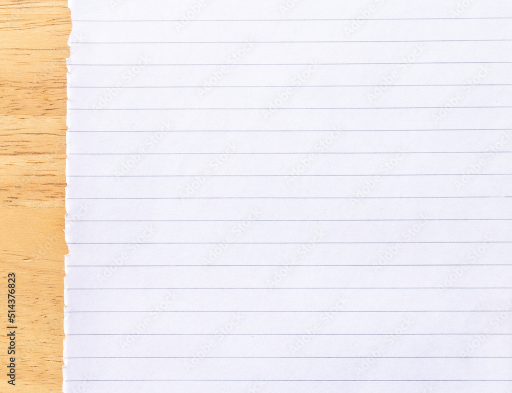 Notebook Lined Paper on wood desk Background Notebook Lined Paper on wood desk Background