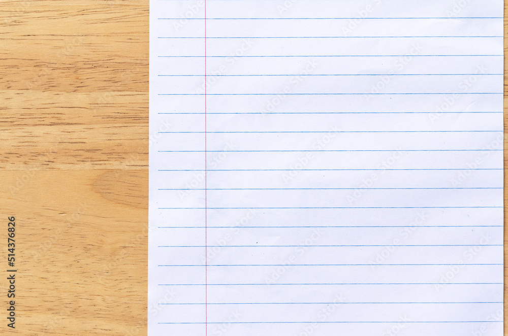 Notebook Lined Paper on wood desk Background Notebook Lined Paper on wood desk Background