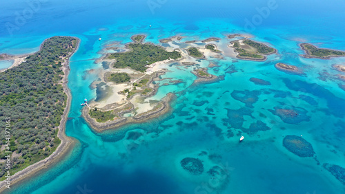 Aerial drone photo of paradise volcanic island complex resembling a blue lagoon archipelago in exotic destination bay with deep turquoise sea and crystal clear water beach © aerial-drone