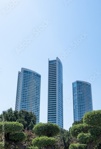 Skyscrapers in city Istanbul against blue sky