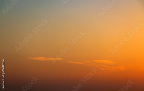 Colorful sunset background with dark and light parts in sky