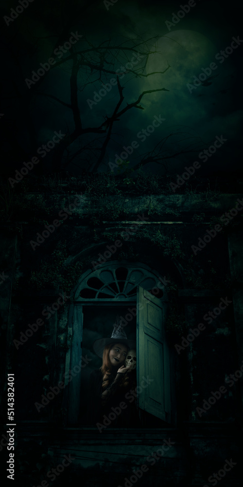 Halloween witch holding a skull standing over ancient castle window, full moon with spooky cloudy sky, Halloween mystery concept Halloween witch holding a skull standing over ancient castle window, full moon with spooky cloudy sky, Halloween mystery concept