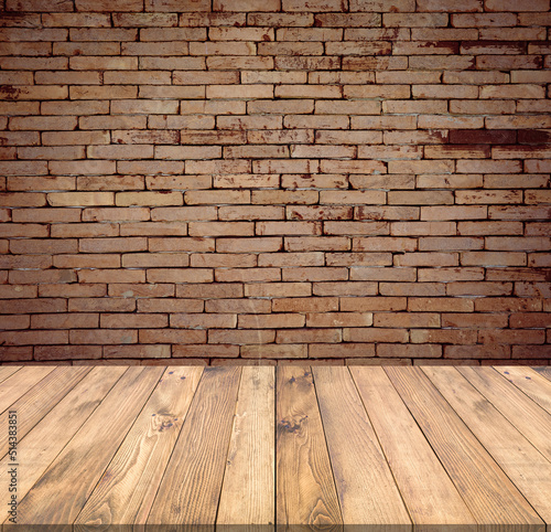 Old wood table with abstract old brick wall with light background for product display © tendo23