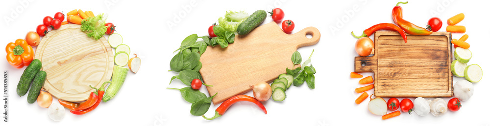 Set of empty wooden cutting boards with fresh vegetables on white background, top view Set of empty wooden cutting boards with fresh vegetables on white background, top view
