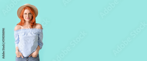 Beautiful redhead woman on ...