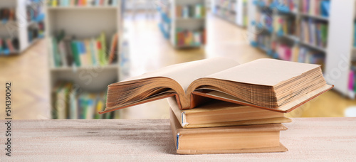 Stack of books on table in ...