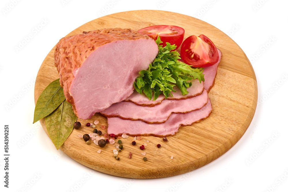 Smoked pork loin on a cutting board with condiments